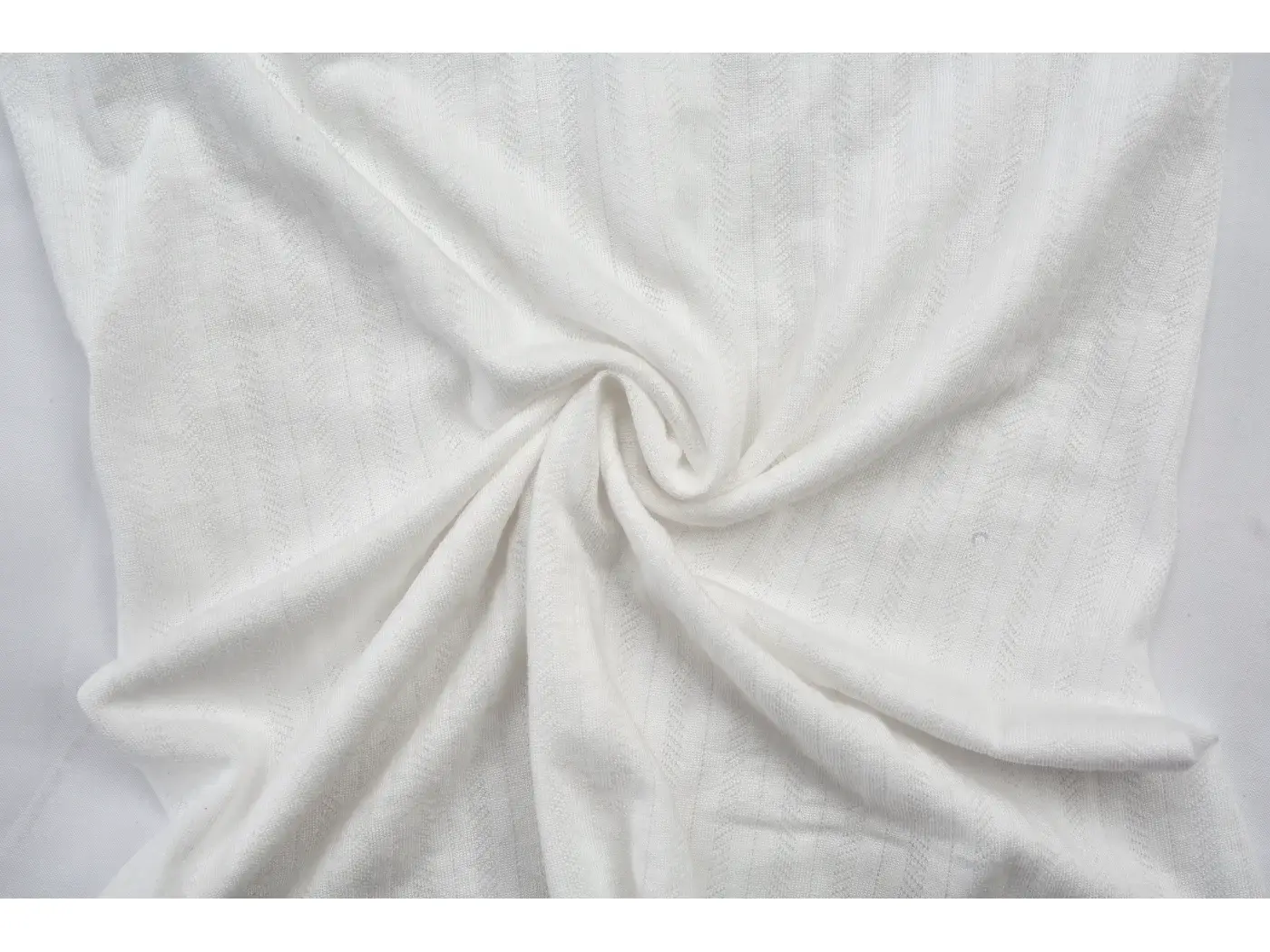 Rib knit fabric in ivory, showing the vertical rib structure